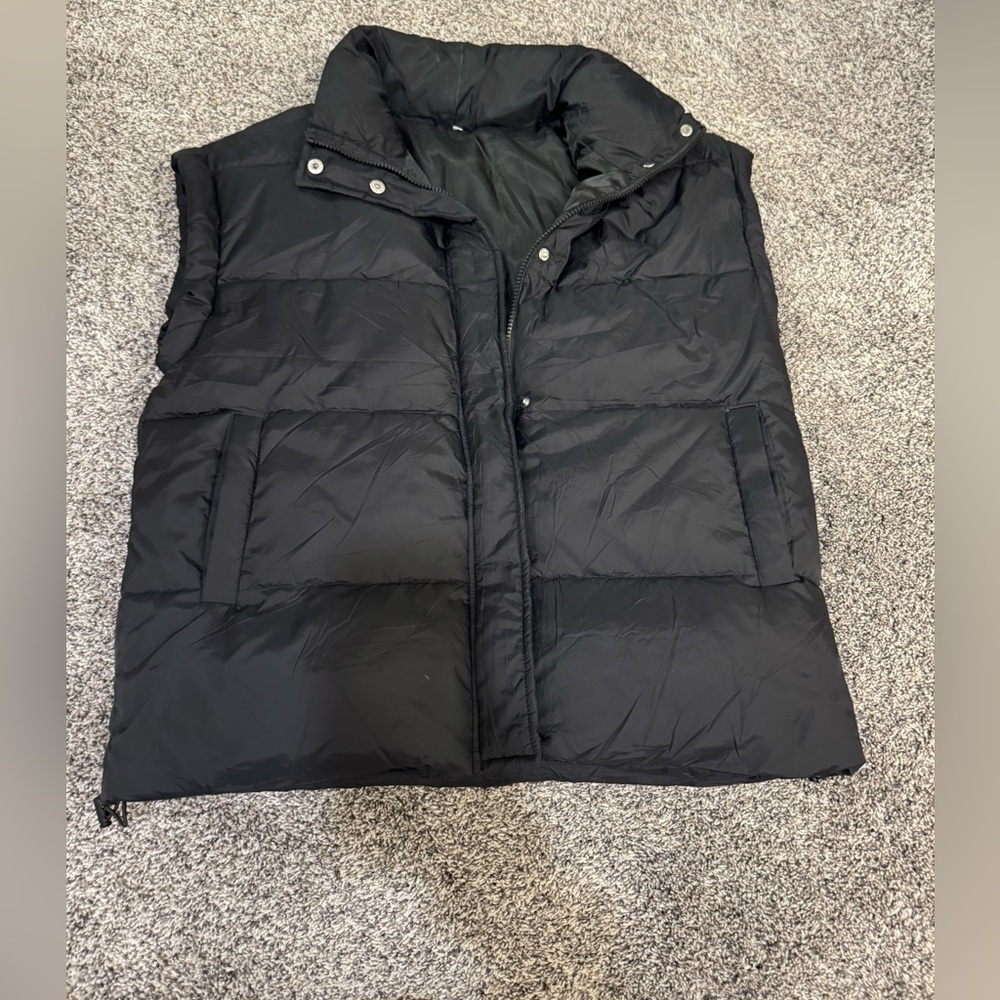 black puffy vest